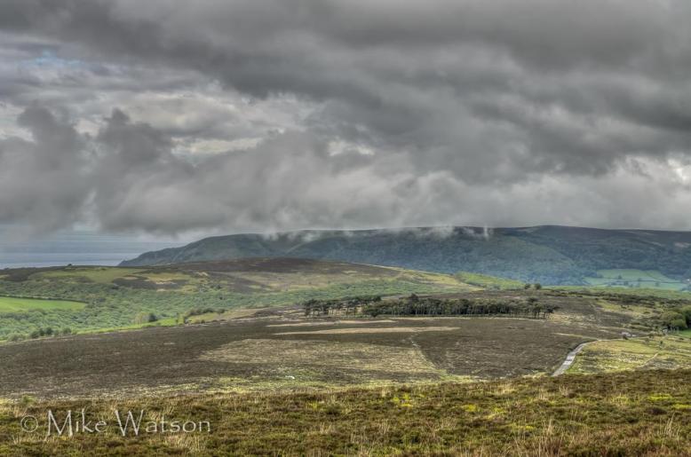 Looking down towards Bossington from Wilmersham Common. Photo by Mike Watson