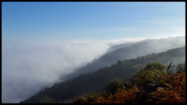 The sea mist rolling in over Exmoor and North Hill. Photo by Paul Feeney.
